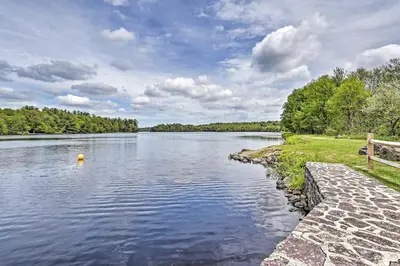 a view of a river with a pathway and trees at Game Room and Fire Pit Chic Pocono Pines Home! in Pocono Pines