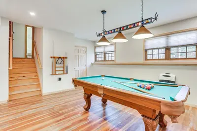 a living room with a pool table in it at Forest-View Deck and Fire Pit Poconos Escape! in East Stroudsburg