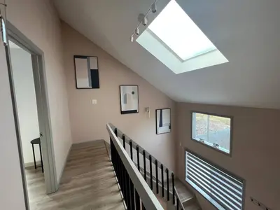 a skylight in a staircase with a skylight at Elegant saver spot in Poconos in East Stroudsburg