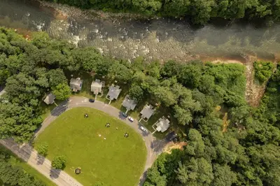 an aerial view of a park with a group of trees at Perch Eagle House - Creek Access, Sauna, Mt views in Boiceville