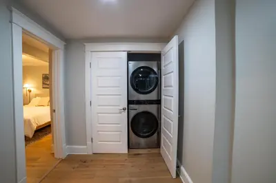 a laundry room with a washer and dryer at Prime Location on Main Street in Stroudsburg