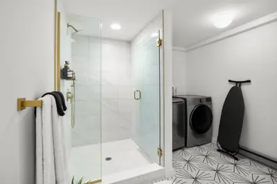 a shower with a glass door in a bathroom at Hudson Valley and The Berkshires Getaway in Hillsdale