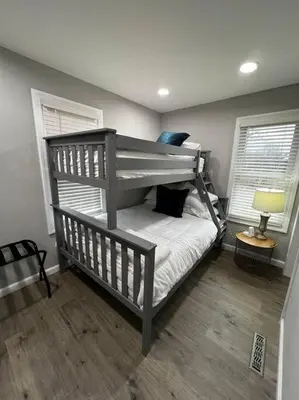 a bedroom with a bunk bed in a room at Esopus Creekside in Lake Katrine