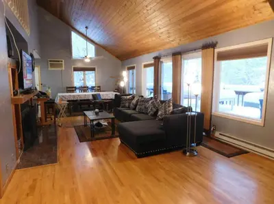 a living room with a couch and a table at Where Memories Are Made in West Kill