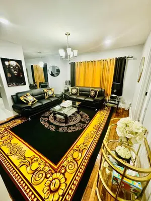 a living room with a couch and a table at fearlessrose vacation Rental 198 in Springfield