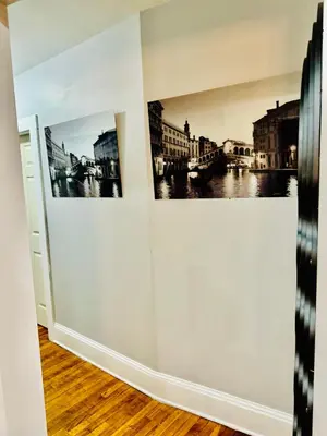 a room with two pictures on the wall at fearlessrose vacation Rental 198 in Springfield