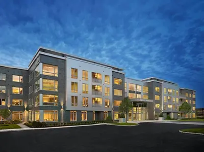 a large apartment building with a lot of windows at AVE Florham Park - Furnished Apartment, Florham Park NJ in Florham Park