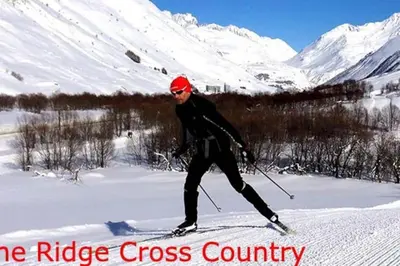 a person is skiing down a snow covered mountain at 2 Bed Berkshire Getaway minutes to Jiminy Peak Ski in Hancock