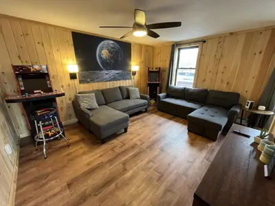 a living room with a couch and a ceiling fan at 2 Bed Berkshire Getaway minutes to Jiminy Peak Ski in Hancock