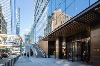 a city street with skyscrapers and a building at Blueground Hudson Yards gym rock wall arcade NYC-1453 in New York