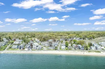 an aerial view of a beach with houses at Beachside in Branford in Stamford