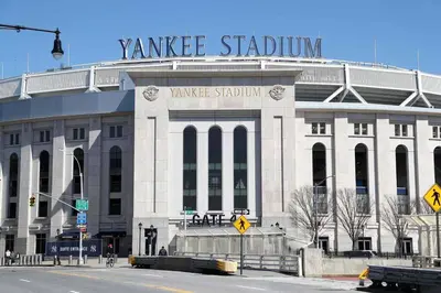 a large white building with a sign on top of it at Family & Traveler Haven - NYC & NWK w/free parking in Newark