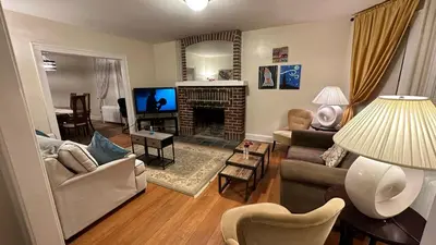 a living room with a couch and a fireplace at Cozy Albany Home in Albany