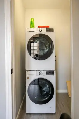 a washer and dryer in a room at Modern 3-Bdrm Apt in Black Rock in Bridgeport