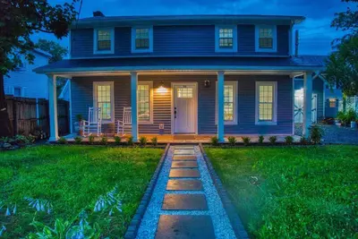 a blue house with a stone walkway in front of a yard at New 3b House in Saugerties Village 4 mins to HITs in Saugerties