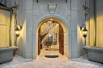 a hallway with an archway in a building at Chateau Montreau on Hudson in Newburgh