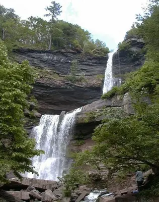 a man standing in front of a waterfall at Hunter Mountain Slope Side Home in Lanesville