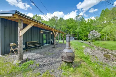 a small building with aendiaryendiary device in front of it at Cozy Catskills Cabin - 12 Mi to Windham Mountain! in East Durham