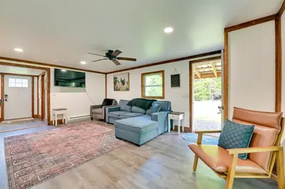 a living room with a couch and chairs at Cozy Catskills Cabin - 12 Mi to Windham Mountain! in East Durham