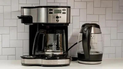 a coffee maker sitting on top of a counter at Modern Rustic Escape w/Hot Tub - High Falls Lodge in Saugerties