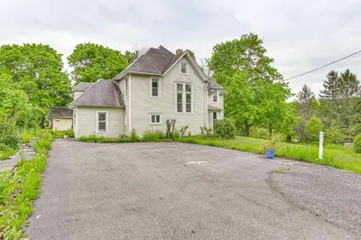 an empty driveway in front of a house at Family Home with Yard and Fire Pit in Middleburgh! in Middleburgh