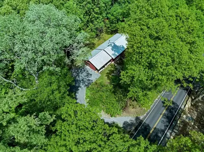 an overhead view of a house in the forest at Saratoga Guest House in Saratoga Springs