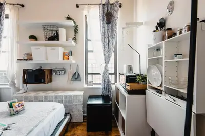 a small bedroom with a bed and a window at Cat Room by Delicate Stays LIVING ROOM CONVERSION SHARED SPACE ROOM ONLY CAT FRIENDLY ONLY 25 min to time square in Jackson Heights