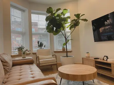 a living room with a couch and a table at Beautiful Apartment shared with the Host in the Heart of Bushwick in Brooklyn