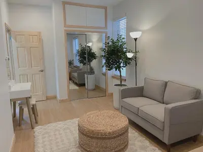 a living room with a couch and a table at Beautiful Apartment shared with the Host in the Heart of Bushwick in Brooklyn