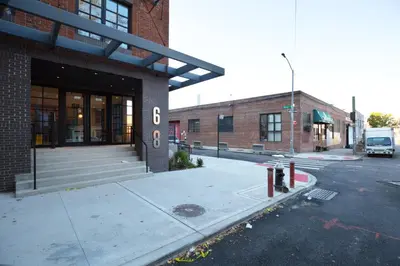 a building with the number in front of it at Dumbo 2br w wd roof gym nr TimeOut Building NYC-961 in Brooklyn