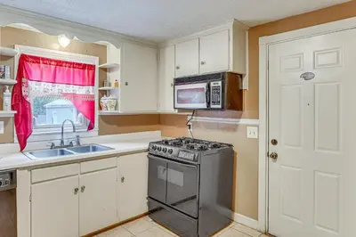 a kitchen with a stove and a microwave at Bring Your Pet and Visit Springfield Westfield Home in Westfield