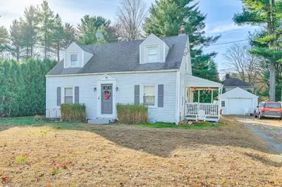 a white house with a porch and a yard at Bring Your Pet and Visit Springfield Westfield Home in Westfield