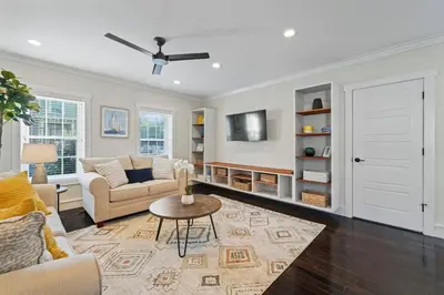 a living room with a couch and a table at Upscale Azure by Saratoga Stays in Saratoga Springs