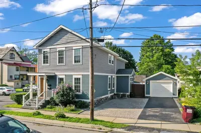 a house on the corner of a street at Upscale Azure by Saratoga Stays in Saratoga Springs