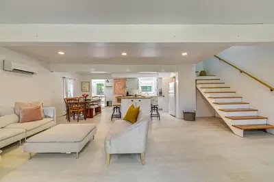 a living room with a staircase and a living room at Charming Catskills Getaway Hike, Bike, Sip and More in Acra