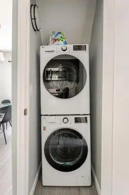 a washer and dryer in a room at Modern 3 Bed House in Black Rock in Bridgeport
