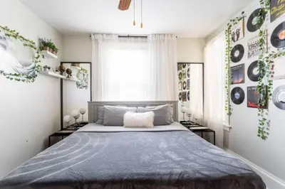 a bedroom with a large bed and a window at Revamped 3BR Apt with Easy Check-In Family-Friendly in Bridgeport