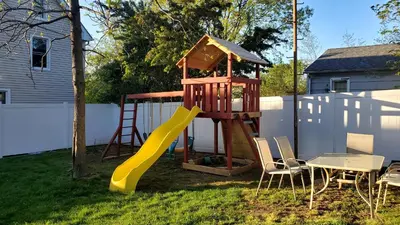 a playground with a slide and a table and chairs at Sunny & Spacious 2BD 1BA WFH Apt-Huge Yard & Patio in Fairfield