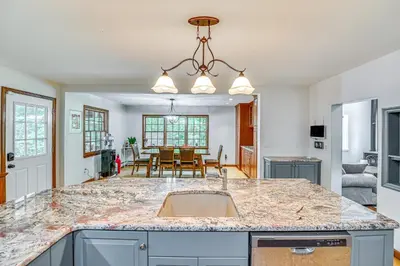 a kitchen with a sink and a counter top at Charming Ballston Spa Home with Sauna and Private Pool in Ballston Spa