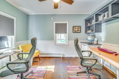 an office with two chairs and a desk with a computer at Charming Ballston Spa Home with Sauna and Private Pool in Ballston Spa