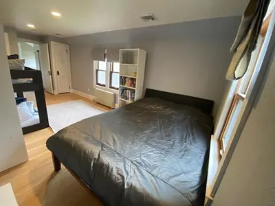 a bedroom with a bed in a room at Enchanting Historic Home near West Point Beacon in Cornwall-on-Hudson