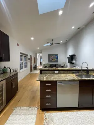 a kitchen with a sink and a counter top at Urban Peak Escape in Lenox