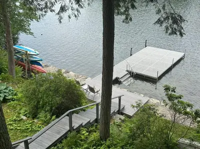 a dock in the middle of a lake with boats at Lake Haven in Monterey