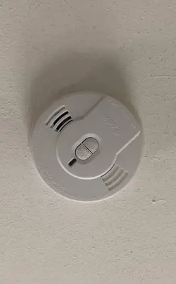 a ceiling with a smoke detector on a ceiling at Spacious and private apartment with 3 bedrooms and 1 bathroom near Newark International Airport EWR and New York City, MetLife Stadium FIFA World Cup 20 minutes away in Newark