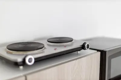 a stove top with two burners on top of it at Manhattan Bridge-Brooklyn-UN Private Suite Bath in Brooklyn