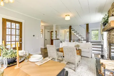 a living room with a table and chairs at Lovely Country Retreat, 4 Mi to Dtwn Narrowsburg! in Narrowsburg