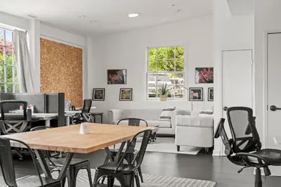 a dining room with a table and chairs at Studio Flat Above Historic Cider Mill in Westport
