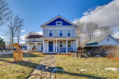 a blue and white house with a stone pathway at Walk to Memorial Park Pet-Friendly Bethlehem Home in Bethlehem