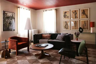 a living room with a couch and a table at KIngston Carriage House in Kingston