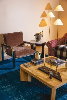 a living room with a couch and a coffee table at KIngston Carriage House in Kingston